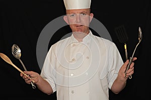 Chef with cooking utensils
