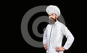 Chef, cooks or baker. Bearded male chefs isolated on black. Cook hat. Serious cook in white uniform, chef hat. Portrait