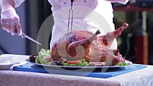 Chef cut up roast turkey