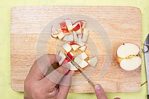 Chef cutting apple