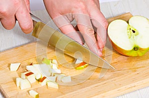 Chef cutting the apple