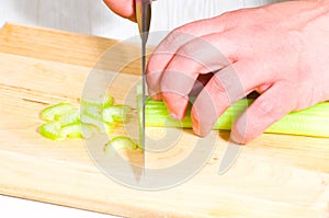 Chef cutting the celery