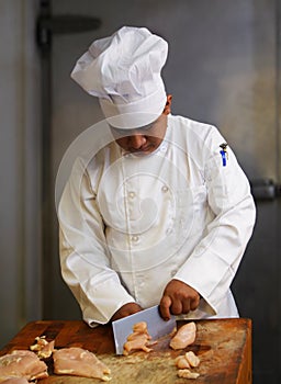 Chef Cutting Meat