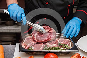 Chef cutting meat