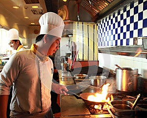 Chef flambe cooking photo