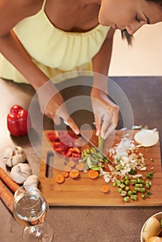 Chef, food and health with woman in kitchen of home to prepare meal for diet or nutrition from above. Cooking