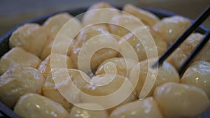 A chef is frying tofu in a pan, fried tofu, hot pot ingredients