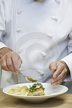 Chef Garnishing Food