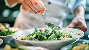 Chef Garnishing a Green Salad With Sauce in a Professional Kitchen