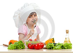 Chef girl tasting healthy food