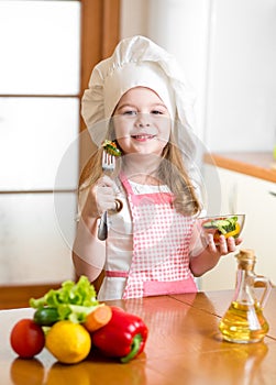 Chef girl tasting healthy food