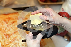 Chef grating cheese