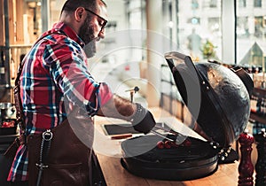 Chef grilling steak in a restaurant