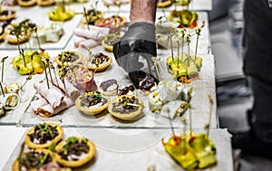 Chef hand in process of Preparing catering food