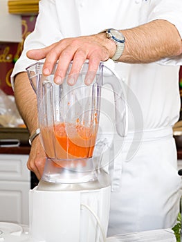 Chef hands with blender