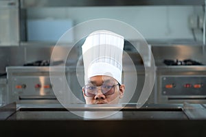 The chef has to control the heat of the stove just right to grill the steak so that the ripeness of the meat is according to the