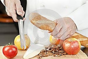 Chef Holds Bread Knife