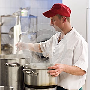 Chef in industrial kitchen