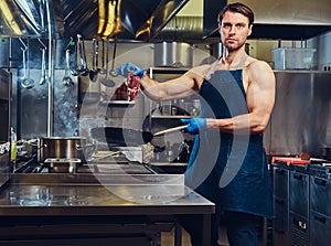 The chef in a kitchen.