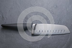 Chef knife on rock table