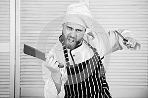 Chef with knifes. Professional in kitchen. culinary cuisine. angry bearded man with knife. love eating food. confident