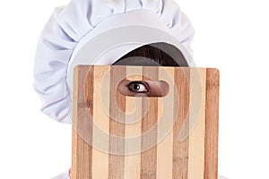 Chef looking with one eye
