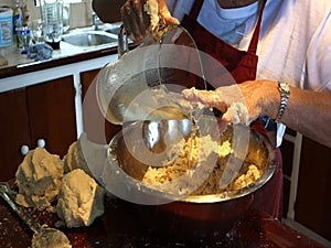 A chef making dough in preparation for christmas