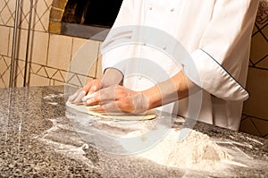 Chef making a Pizza Base