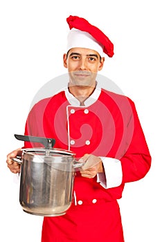 Chef male holding inox pot photo