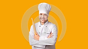 Chef Man Holding Rolling Pin Standing On Yellow Background, Panorama