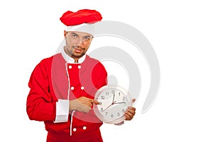 Chef man indicate to clock