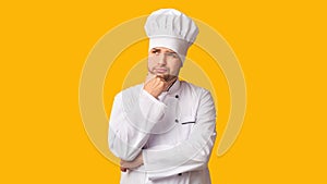 Chef Man Thinking Touching Chin Standing Over Yellow Background, Panorama