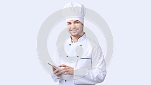 Chef Man Using Smartphone Standing Over White Background, Panorama