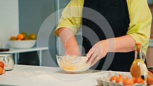 Chef mixing bread ingredients