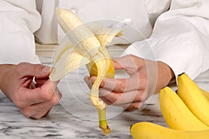 Chef Peeling Banana