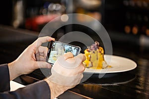 Chef photographing his creation