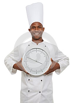 Chef, portrait and happy man with clock for time, speed or deadline isolated on a white studio background. Face, cooking