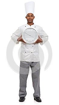 Chef, portrait and man with clock for time, speed or deadline isolated on a white studio background. Serious, cooking