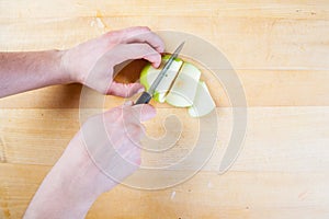 Chef prepare apple in the kitchen