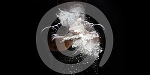 Chef prepare white flour dust for cooking bakery food. Elderly man Chef clap hand, white flour dust explode fly in air. Flour stop