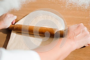 The chef prepares the dough - the process of making dough in the kitchen