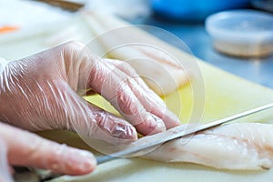 Chef prepares sashimi