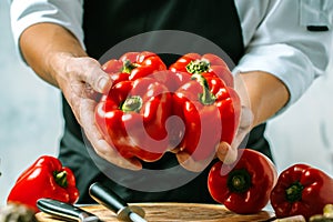 Chef prepares vegetables to cook in the restaurant kitchen