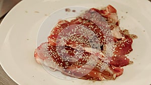 Chef preparing beef steak with soy sauce marinade