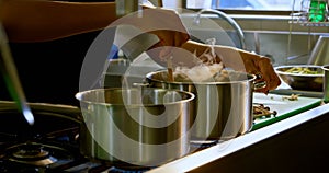 Chef preparing food in kitchen at restaurant 4k