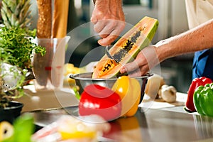 Chef preparing fruits