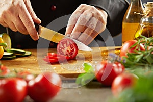 Chef preparing a healthy salad with fresh food