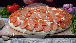 Chef preparing a pizza. Frame. Pizza Place. Food Preparation. Pizza Chef. Chef tossing pizza dough in commercial kitchen