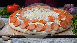 Chef preparing a pizza. Frame. Pizza Place. Food Preparation. Pizza Chef. Chef tossing pizza dough in commercial kitchen