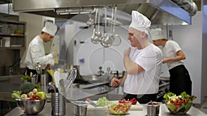 Chef preparing salad then hurts shoulder injury